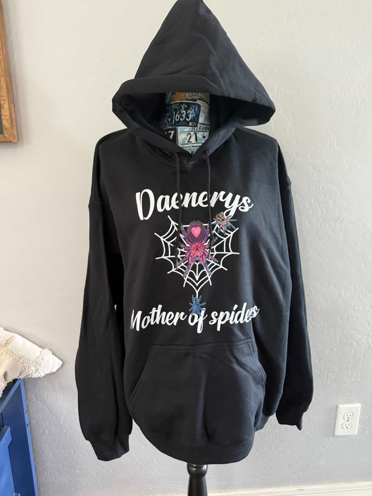 Black “DaenerysMotherOfSpiders” hoodie (white writing)
